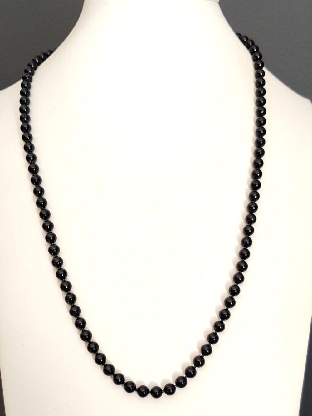 Black single strand beaded necklace